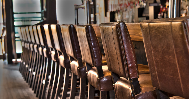 Interior, bar area, chairs lined up