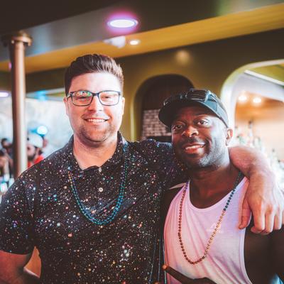 Two guests smiling, photo portrait