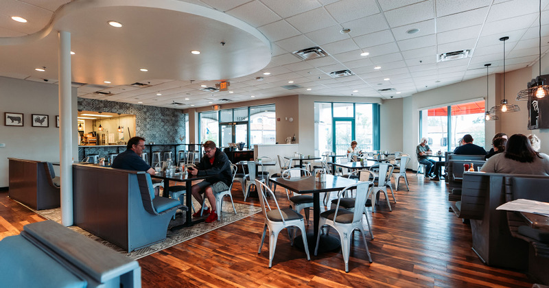 Restaurant interior, tables ready for guests