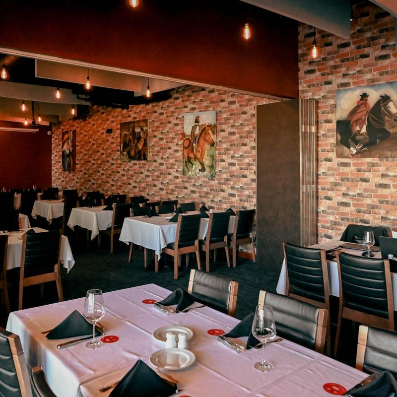 Dining area, tables set and ready for guests