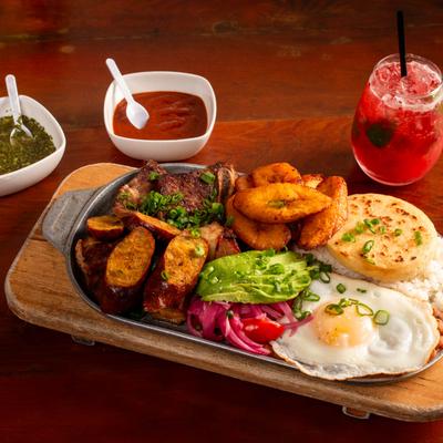 The Colombian platter with beef, egg, rice, and other ingredients.