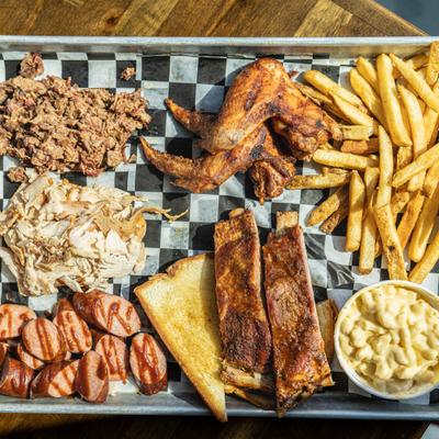 Sample Platter with sides of French fries and mac and cheese.