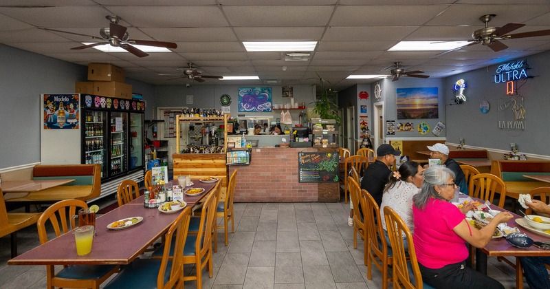 Diner area, tables, chairs, guests