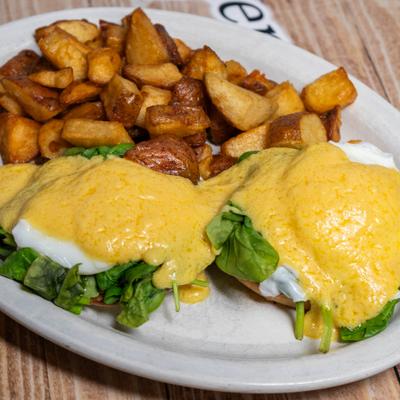 Eggs Florentine and potatoes.
