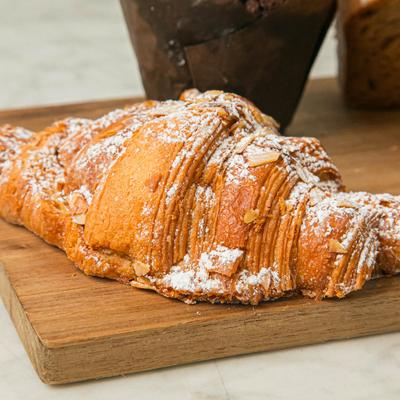 Croissant with powdered sugar.