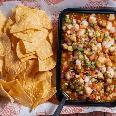 Shrimp ceviche served with tortilla chips.