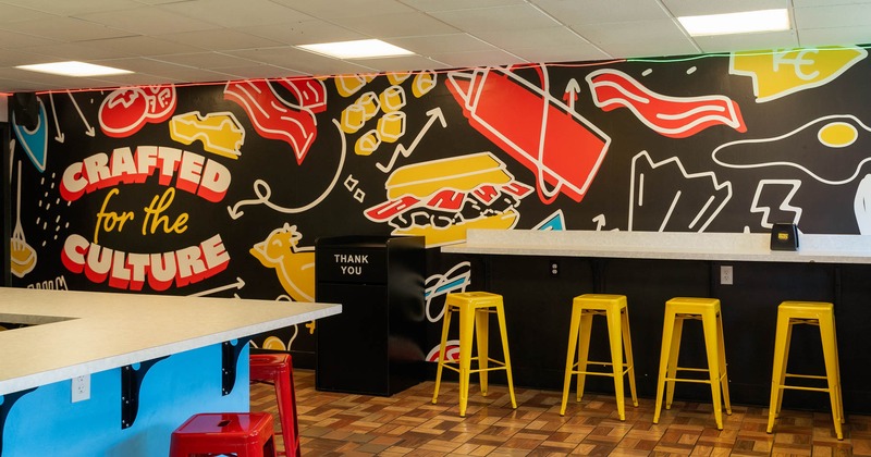 Interior, seating area, big mural on the wall