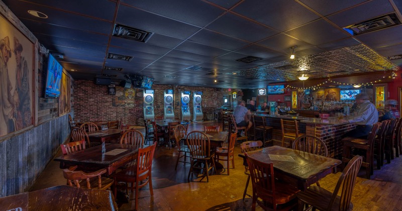 Inside, seating area, bar, customers, arcade games