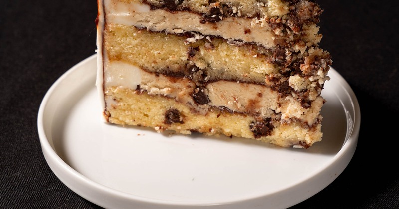 Chocolate Chip Layer Cake topped with a chocolate ganache and cookie chunks