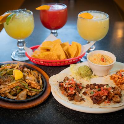 Assorted food and Margaritas.