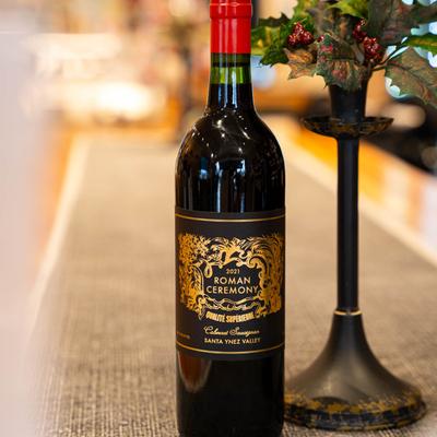 Bottle of wine, side view.