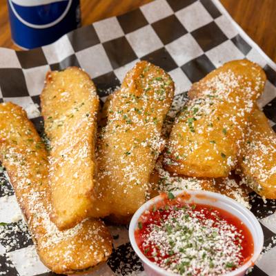Fried zucchini topped with grated Parmesan served with marinara dipping sauce.