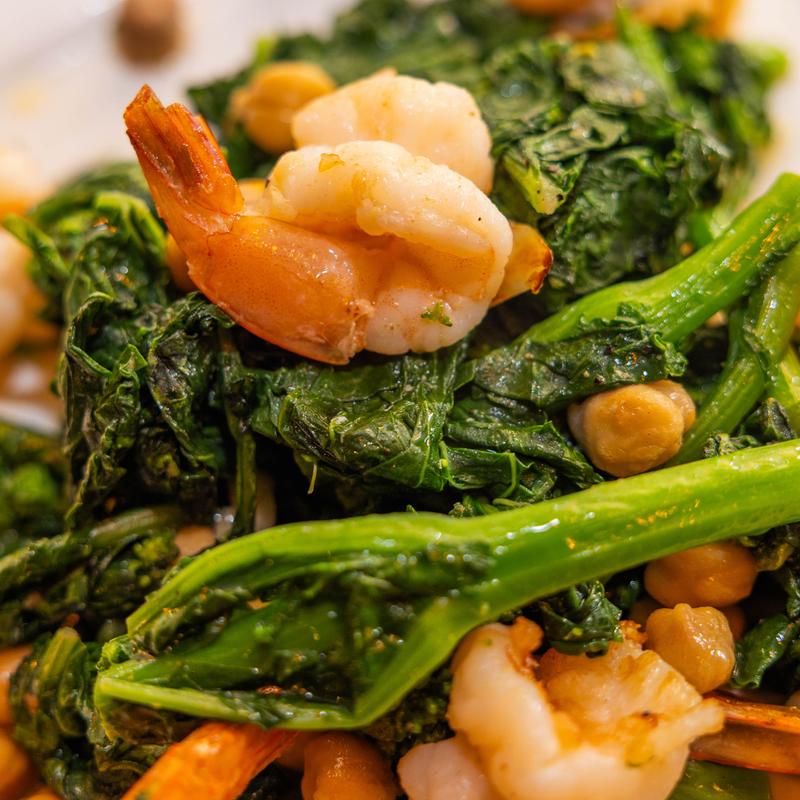 Grilled Shrimp over Sautéed Broccoli Rabe photo