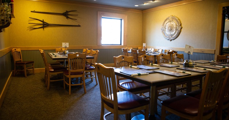 Interior, three tables with chairs waiting for the guests