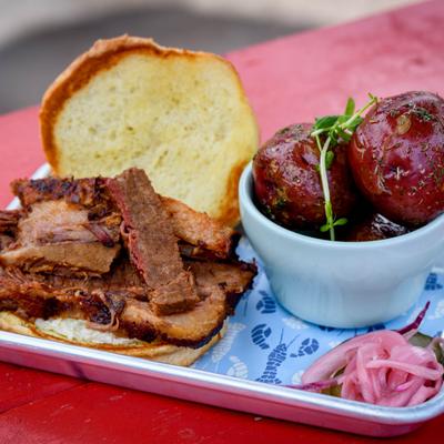Brisket Sandwich with a side of Herb Butter Potatoes