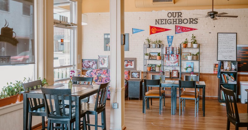 Interior, dining area, restaurant entrance, high and regular tables, white brick walls
