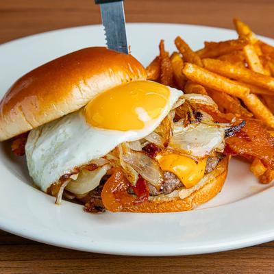 Breakfast burger with fries.