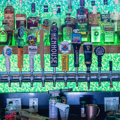 12 beers on tap and hundreds of different spirits and cordials.