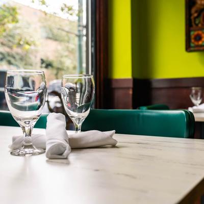 Table detail, glassware and napkins.