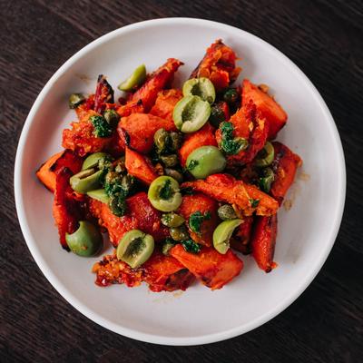Carrots with Sweet Potato Romesco, Capers and Smoked Olives..