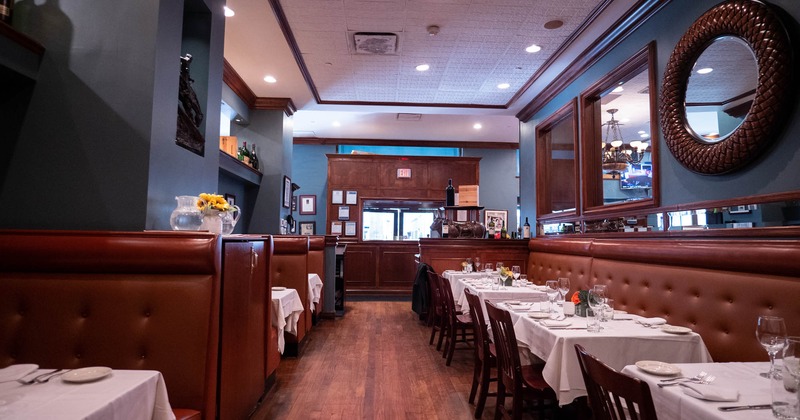 Interior, tables, chairs and seating booths lined up