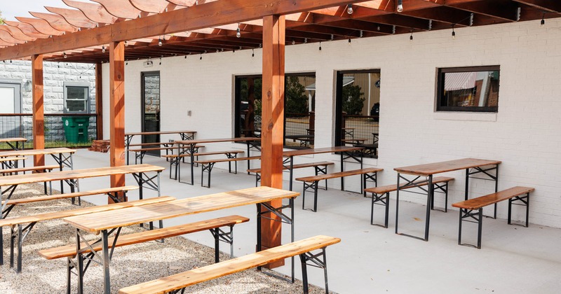 Outdoor seating area with picnic tables