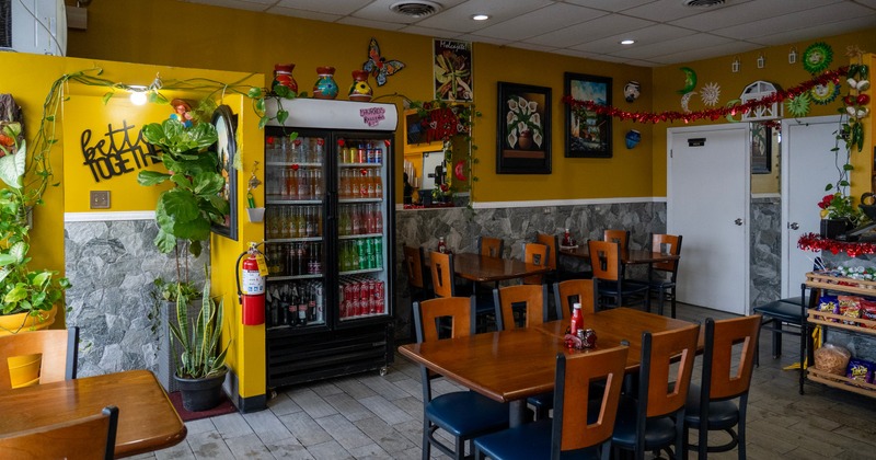Dining area with decorations on the wall