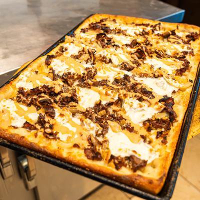 Rectangular beef pizza.