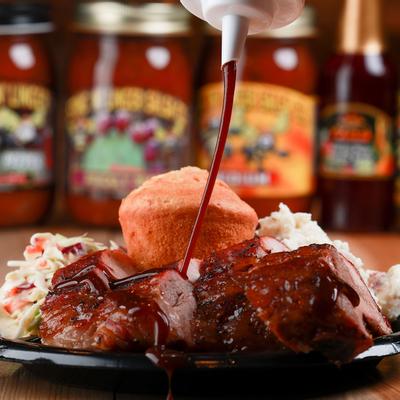 Grilled sliced meat, salad on the side