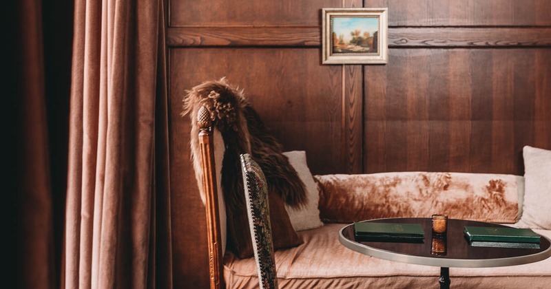 Interior, seating place by the window with curtains