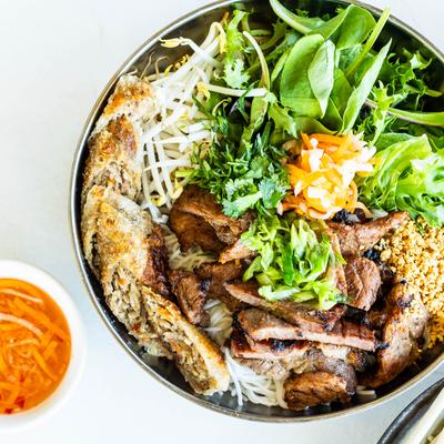 Absolute dish, with grilled pork and Vietnamese egg rolls