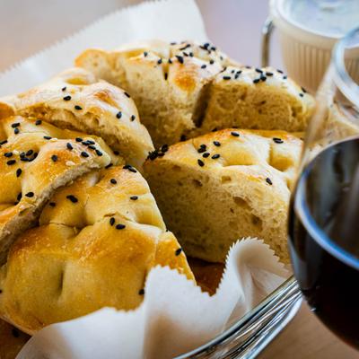 Bread with black and white sesame seeds, close up.