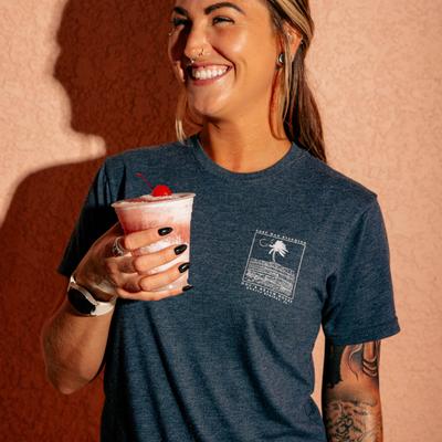 Employee holding a drink.