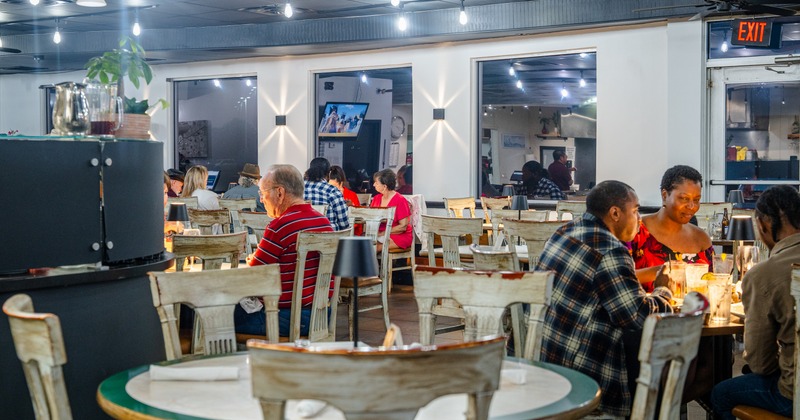Interior, dining area with round tables