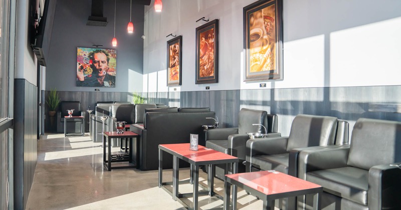 Interior, seating area, coffee tables, framed pictures on the wall