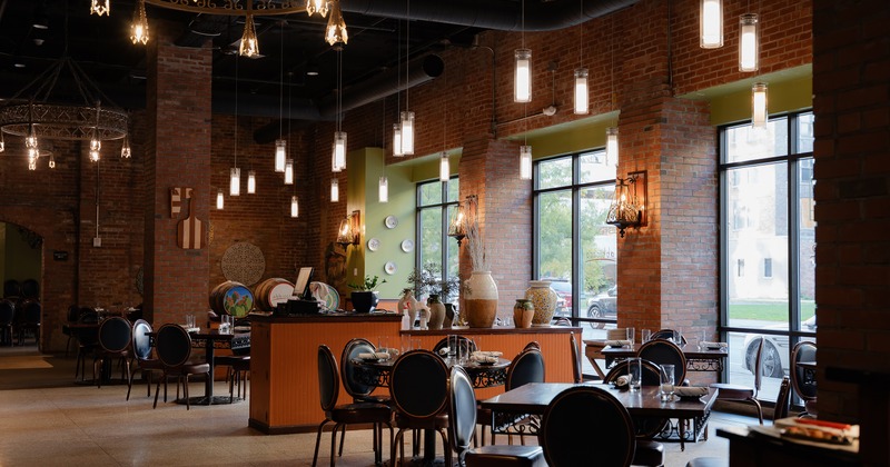 Nicely done interior dining area with set tables ready for guests
