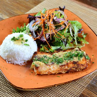 Fish and rice with a salad.