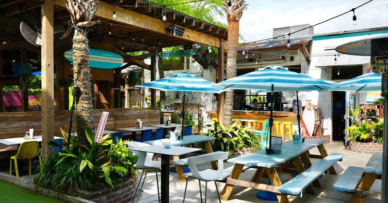 Outdoor, seating area with tables and chairs