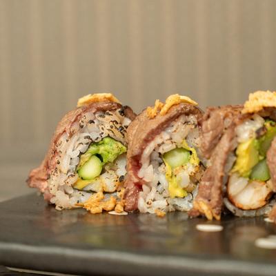 Sauteed lobster, asparagus, avocado, cucumber, and filet mignon rolls.