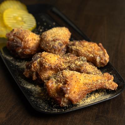 Lemon pepper wings, front view.
