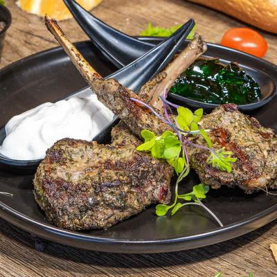 Grilled Lamb Chops, with mint pearls and yogurt sauce.