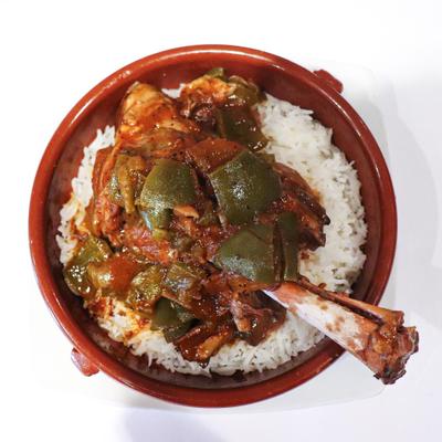 Cooked meat, vegetables, spices and rice