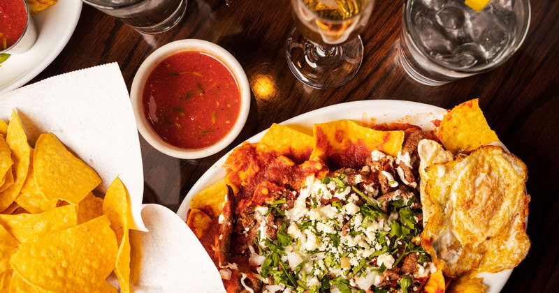 Snacks, mixed vegetables, dip and cocktails