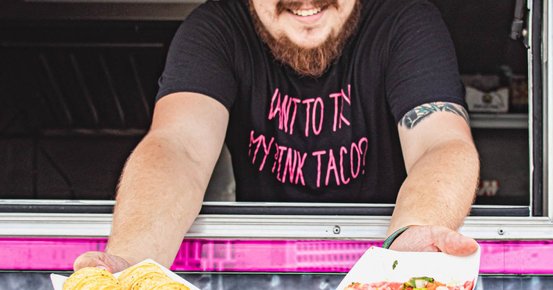 Staff member posing for a photo