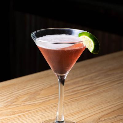 Cosmopolitan garnished with lime.