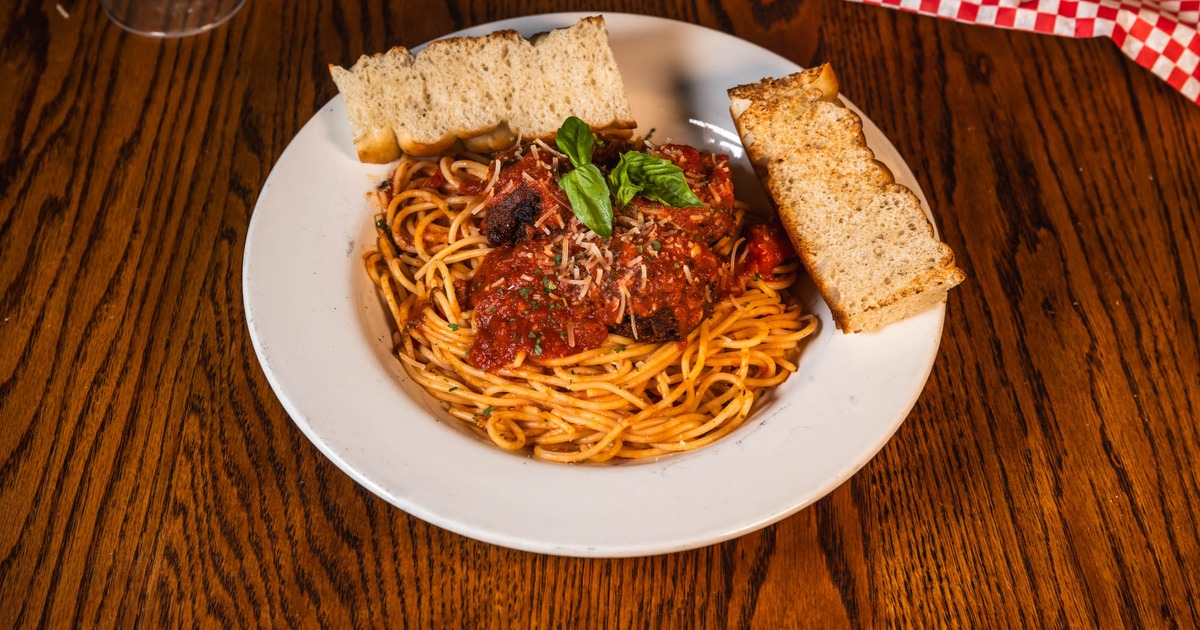 Spaghetti and meatballs in marinara, served with house focaccia