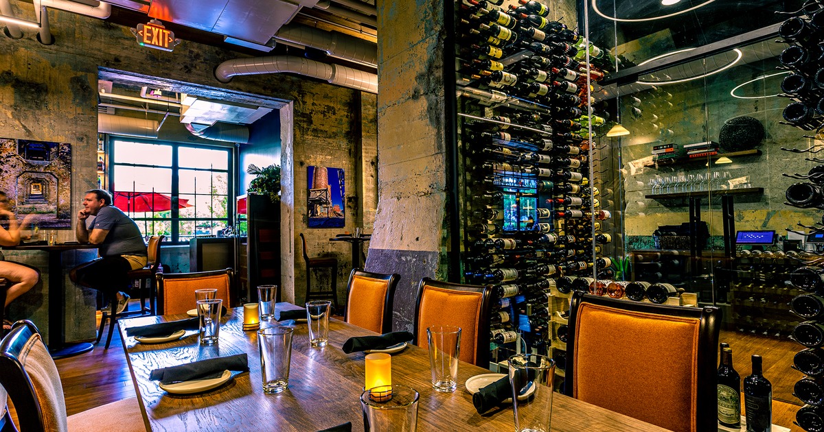 Interior, set table by a wine rack