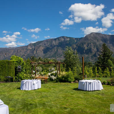 Restaurant grass area with natural landscape in the back