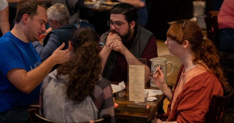 Dining place with guest eating and drinking