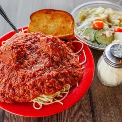 Spaghetti with Meatballs served with side salad and garlic toast.